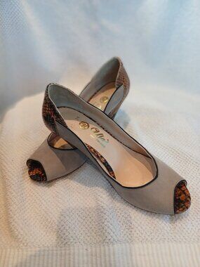 Crisp suede and multi colored croco leather short heels . New and unworn.